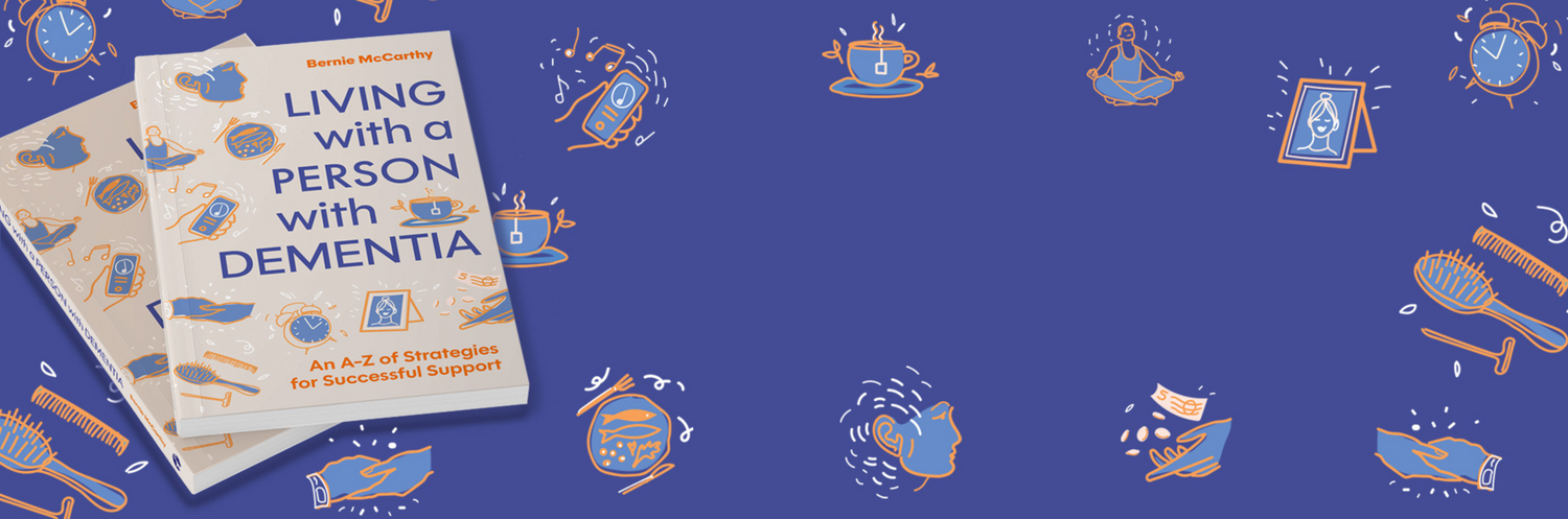 A dark blue background with scattered illustrations, including a hairbrush, a cup of tea, a phone playing music, an alarm clock and someone meditating. On the left is two copies of the book 'Living with a Person with Dementia'. 